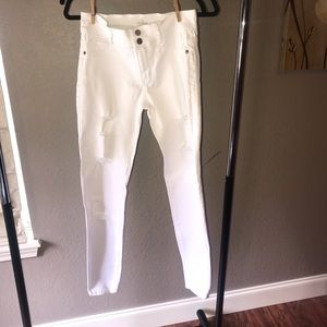 White high waisted jeggings with holes